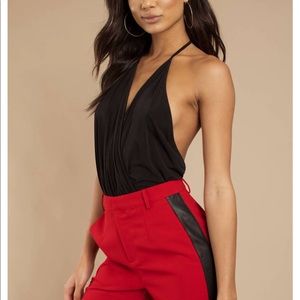 Backless, deep V bodysuit